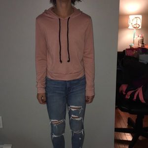 Pink crop top sweatshirt.